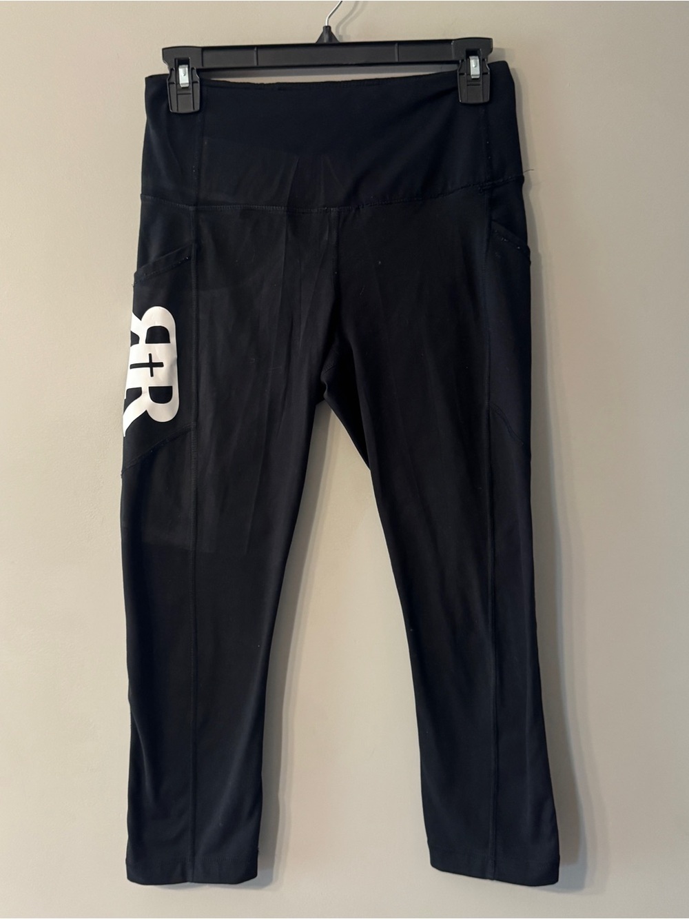 Reworked Revival | Black Capri Leggings with White Side Graphic | M